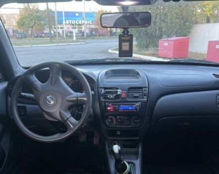 Черный Ниссан Альмера, объемом двигателя 1.5 л и пробегом 322 тыс. км за 3050 $, фото 4 на Automoto.ua