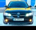 Черный Ниссан Альмера, объемом двигателя 1.5 л и пробегом 200 тыс. км за 3200 $, фото 1 на Automoto.ua