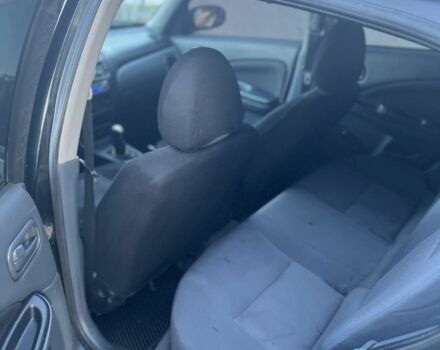 Черный Ниссан Альмера, объемом двигателя 1.5 л и пробегом 322 тыс. км за 3050 $, фото 5 на Automoto.ua