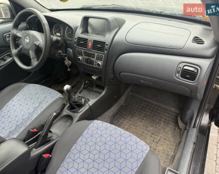 Чорний Ніссан Альмера, об'ємом двигуна 1.5 л та пробігом 183 тис. км за 3950 $, фото 7 на Automoto.ua