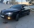 Черный Ниссан Альмера, объемом двигателя 1.5 л и пробегом 322 тыс. км за 3050 $, фото 1 на Automoto.ua