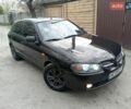 Черный Ниссан Альмера, объемом двигателя 1.5 л и пробегом 200 тыс. км за 2550 $, фото 1 на Automoto.ua