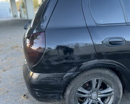 Черный Ниссан Альмера, объемом двигателя 1.5 л и пробегом 322 тыс. км за 3050 $, фото 6 на Automoto.ua