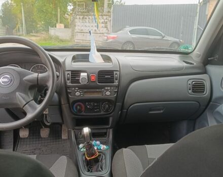 Черный Ниссан Альмера, объемом двигателя 1.5 л и пробегом 205 тыс. км за 3700 $, фото 6 на Automoto.ua