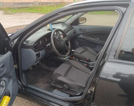 Черный Ниссан Альмера, объемом двигателя 1.5 л и пробегом 205 тыс. км за 3700 $, фото 3 на Automoto.ua