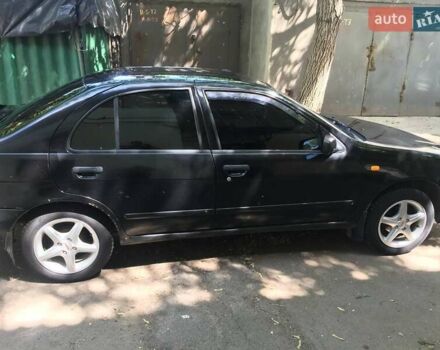 Чорний Ніссан Альмера, об'ємом двигуна 1.4 л та пробігом 270 тис. км за 2700 $, фото 2 на Automoto.ua