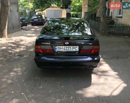 Чорний Ніссан Альмера, об'ємом двигуна 1.4 л та пробігом 270 тис. км за 2700 $, фото 3 на Automoto.ua