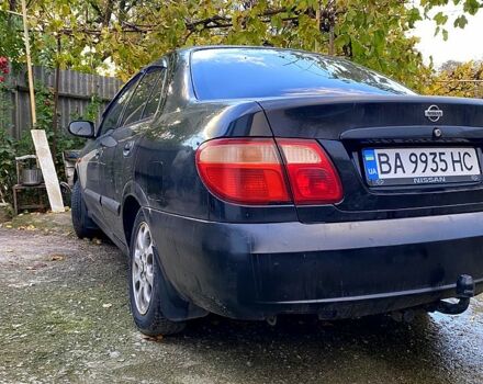 Черный Ниссан Альмера, объемом двигателя 1.5 л и пробегом 221 тыс. км за 3500 $, фото 8 на Automoto.ua