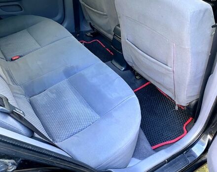 Черный Ниссан Альмера, объемом двигателя 1.5 л и пробегом 221 тыс. км за 3500 $, фото 9 на Automoto.ua