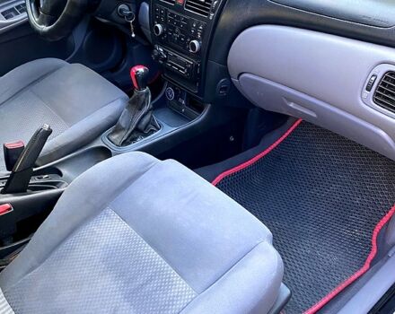 Черный Ниссан Альмера, объемом двигателя 1.5 л и пробегом 221 тыс. км за 3500 $, фото 7 на Automoto.ua