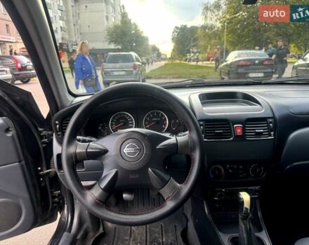 Черный Ниссан Альмера, объемом двигателя 1.5 л и пробегом 188 тыс. км за 3800 $, фото 24 на Automoto.ua