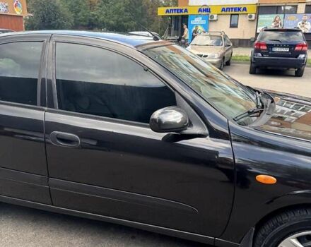 Черный Ниссан Альмера, объемом двигателя 1.5 л и пробегом 188 тыс. км за 3800 $, фото 4 на Automoto.ua