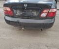 Чорний Ніссан Альмера, об'ємом двигуна 1.5 л та пробігом 150 тис. км за 2500 $, фото 2 на Automoto.ua