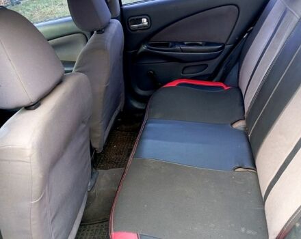 Черный Ниссан Альмера, объемом двигателя 1.5 л и пробегом 315 тыс. км за 2650 $, фото 3 на Automoto.ua