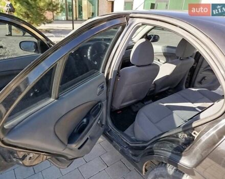 Черный Ниссан Альмера, объемом двигателя 1.5 л и пробегом 269 тыс. км за 2550 $, фото 16 на Automoto.ua