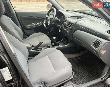 Черный Ниссан Альмера, объемом двигателя 1.77 л и пробегом 203 тыс. км за 3200 $, фото 19 на Automoto.ua