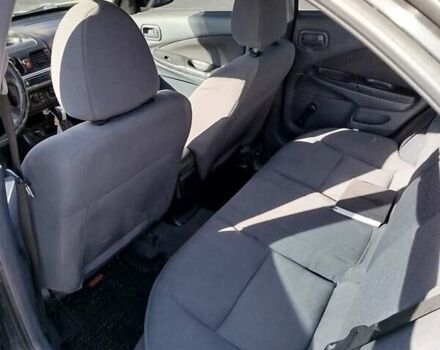 Черный Ниссан Альмера, объемом двигателя 1.5 л и пробегом 269 тыс. км за 2550 $, фото 20 на Automoto.ua