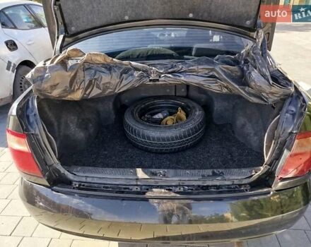 Черный Ниссан Альмера, объемом двигателя 1.5 л и пробегом 269 тыс. км за 2550 $, фото 28 на Automoto.ua