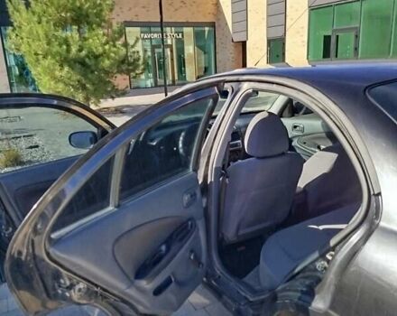 Черный Ниссан Альмера, объемом двигателя 1.5 л и пробегом 269 тыс. км за 2550 $, фото 8 на Automoto.ua