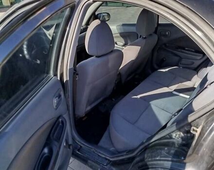 Черный Ниссан Альмера, объемом двигателя 1.5 л и пробегом 269 тыс. км за 2550 $, фото 13 на Automoto.ua