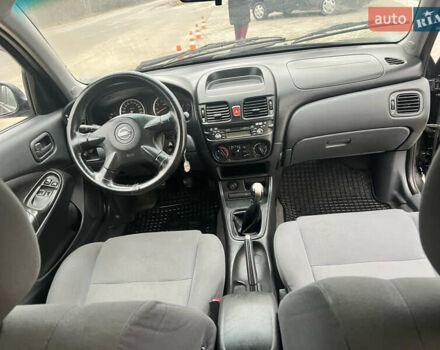 Черный Ниссан Альмера, объемом двигателя 1.77 л и пробегом 203 тыс. км за 3200 $, фото 24 на Automoto.ua