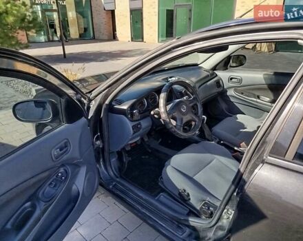 Черный Ниссан Альмера, объемом двигателя 1.5 л и пробегом 269 тыс. км за 2550 $, фото 7 на Automoto.ua