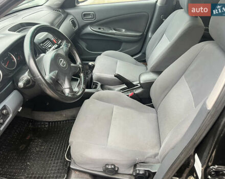 Черный Ниссан Альмера, объемом двигателя 1.77 л и пробегом 203 тыс. км за 3200 $, фото 14 на Automoto.ua