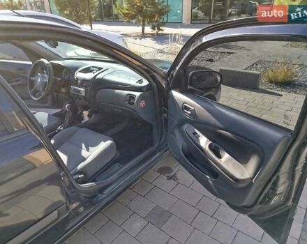 Черный Ниссан Альмера, объемом двигателя 1.5 л и пробегом 269 тыс. км за 2550 $, фото 22 на Automoto.ua