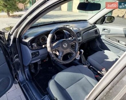 Черный Ниссан Альмера, объемом двигателя 1.5 л и пробегом 269 тыс. км за 2550 $, фото 5 на Automoto.ua