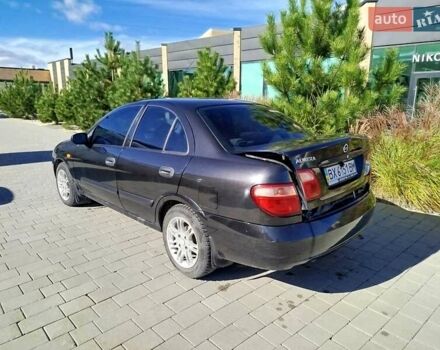 Черный Ниссан Альмера, объемом двигателя 1.5 л и пробегом 269 тыс. км за 2550 $, фото 27 на Automoto.ua