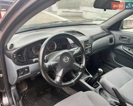 Черный Ниссан Альмера, объемом двигателя 1.77 л и пробегом 203 тыс. км за 3200 $, фото 15 на Automoto.ua