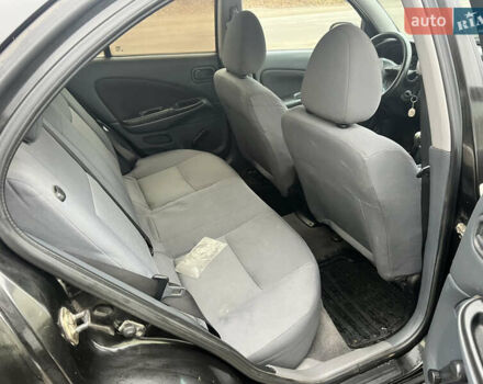 Черный Ниссан Альмера, объемом двигателя 1.77 л и пробегом 203 тыс. км за 3200 $, фото 23 на Automoto.ua