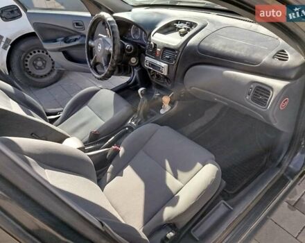 Черный Ниссан Альмера, объемом двигателя 1.5 л и пробегом 269 тыс. км за 2550 $, фото 14 на Automoto.ua