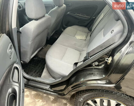 Черный Ниссан Альмера, объемом двигателя 1.77 л и пробегом 203 тыс. км за 3200 $, фото 17 на Automoto.ua