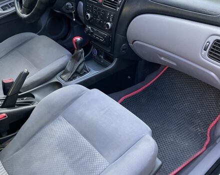 Черный Ниссан Альмера, объемом двигателя 1.6 л и пробегом 2 тыс. км за 3500 $, фото 7 на Automoto.ua