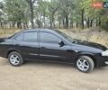 Черный Ниссан Альмера, объемом двигателя 1.6 л и пробегом 223 тыс. км за 4600 $, фото 12 на Automoto.ua