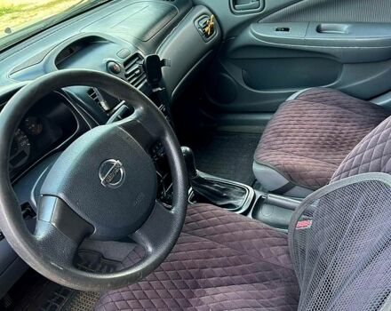 Чорний Ніссан Альмера, об'ємом двигуна 1.6 л та пробігом 0 тис. км за 4500 $, фото 2 на Automoto.ua