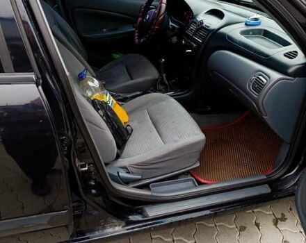 Черный Ниссан Альмера, объемом двигателя 1.6 л и пробегом 224 тыс. км за 3300 $, фото 1 на Automoto.ua