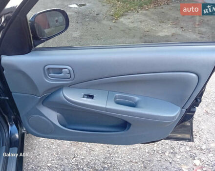 Черный Ниссан Альмера, объемом двигателя 1.6 л и пробегом 185 тыс. км за 4500 $, фото 52 на Automoto.ua