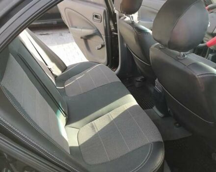 Черный Ниссан Альмера, объемом двигателя 1.6 л и пробегом 230 тыс. км за 5000 $, фото 3 на Automoto.ua