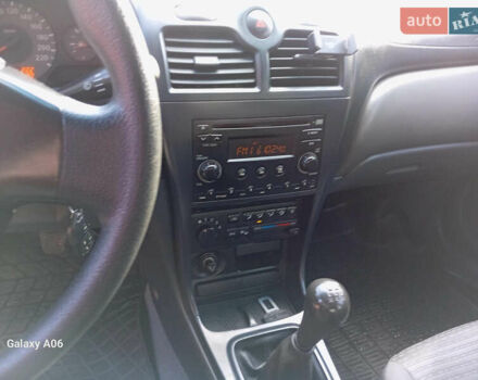 Черный Ниссан Альмера, объемом двигателя 1.6 л и пробегом 185 тыс. км за 4500 $, фото 49 на Automoto.ua