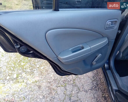 Черный Ниссан Альмера, объемом двигателя 1.6 л и пробегом 185 тыс. км за 4500 $, фото 51 на Automoto.ua