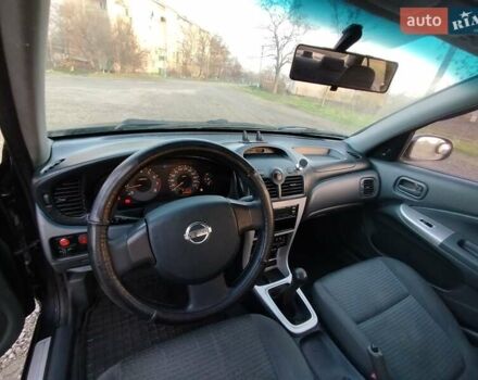 Черный Ниссан Альмера, объемом двигателя 1.6 л и пробегом 244 тыс. км за 4500 $, фото 50 на Automoto.ua