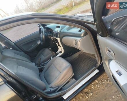 Черный Ниссан Альмера, объемом двигателя 1.6 л и пробегом 244 тыс. км за 4500 $, фото 48 на Automoto.ua