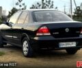 Черный Ниссан Альмера, объемом двигателя 1.6 л и пробегом 326 тыс. км за 4150 $, фото 1 на Automoto.ua