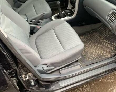 Чорний Ніссан Альмера, об'ємом двигуна 1.6 л та пробігом 300 тис. км за 2999 $, фото 7 на Automoto.ua