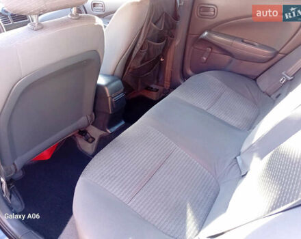 Черный Ниссан Альмера, объемом двигателя 1.6 л и пробегом 185 тыс. км за 4500 $, фото 73 на Automoto.ua