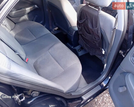 Черный Ниссан Альмера, объемом двигателя 1.6 л и пробегом 185 тыс. км за 4500 $, фото 66 на Automoto.ua