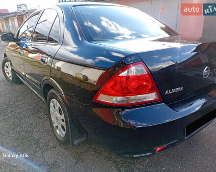 Черный Ниссан Альмера, объемом двигателя 1.6 л и пробегом 185 тыс. км за 4500 $, фото 21 на Automoto.ua