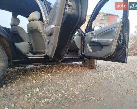 Черный Ниссан Альмера, объемом двигателя 1.6 л и пробегом 244 тыс. км за 4500 $, фото 52 на Automoto.ua